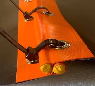 Grommets Connected with Cable Zip Ties