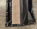 containment boom with permeable skirt